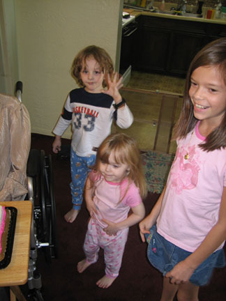 Great grand children waiting for the cake.
